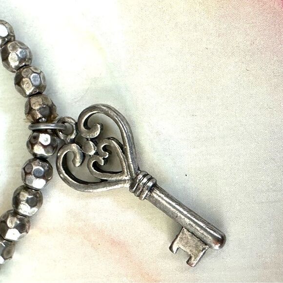 Silver/brass tone charm stretchy bracelet - Picture 8 of 8